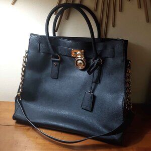 Michael Kors black leather bag with gold hardware lock + key